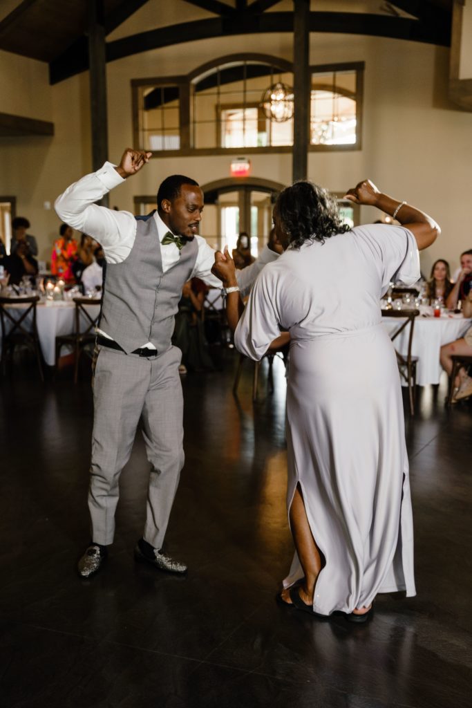 the groom and his mama dance at his south haven michigan wedding reception