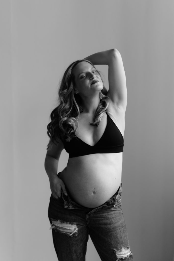 a black and white michigan maternity photographer portrait of a pregnant mother