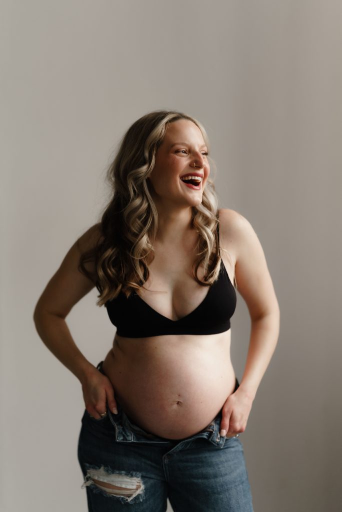 chelsea laughs during her maternity photoshoot
