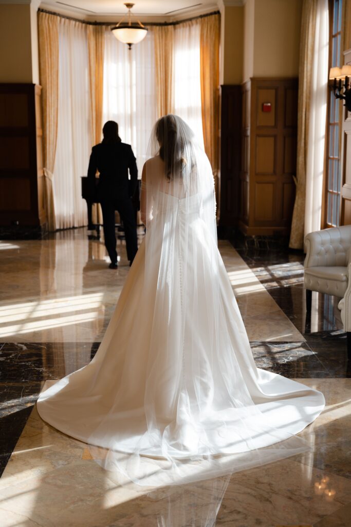 the bride and groom share a first look - part of their royal park hotel wedding photos