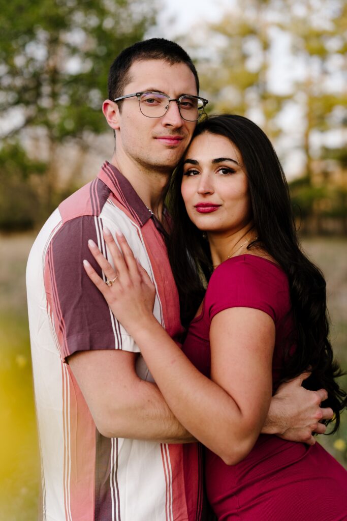 spencer and dalia smile together during their engagement photos